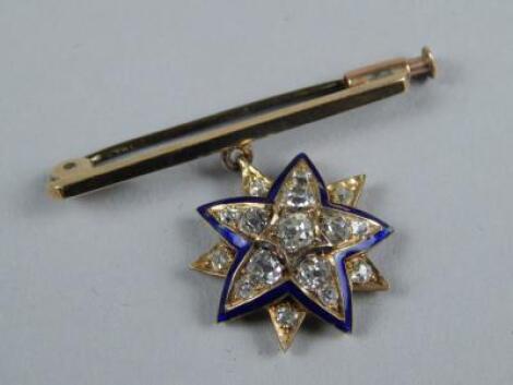 A diamond set bar brooch