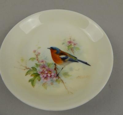 A Royal Worcester style saucer