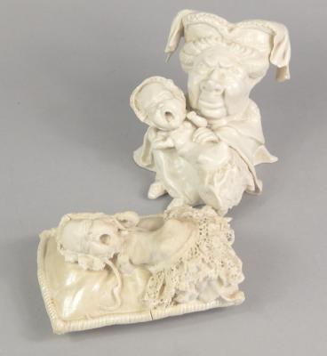 An unusual pair of Victorian style porcelain figurines