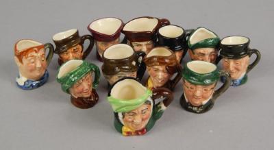 A collection of Royal Doulton tiny character jugs