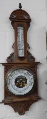 A late 19thC aneroid barometer and thermometer