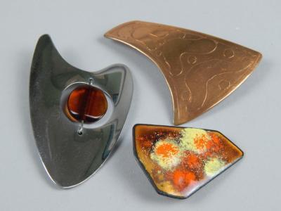 Three brooches