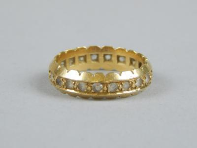 An 18ct gold eternity ring