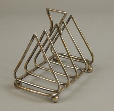 A Victorian silver four division toast rack