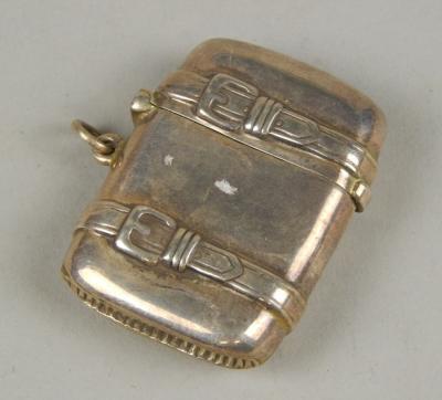 A novelty white metal vesta case