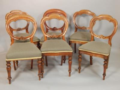 A set of six Victorian mahogany balloon back chairs