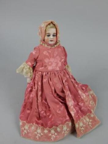 An Armand Marseille bisque headed doll