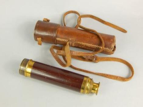 An early 20thC brass and leather five part telescope