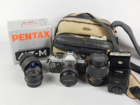 A camera and various lenses