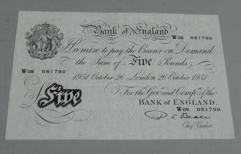 A Bank of England white five pound note