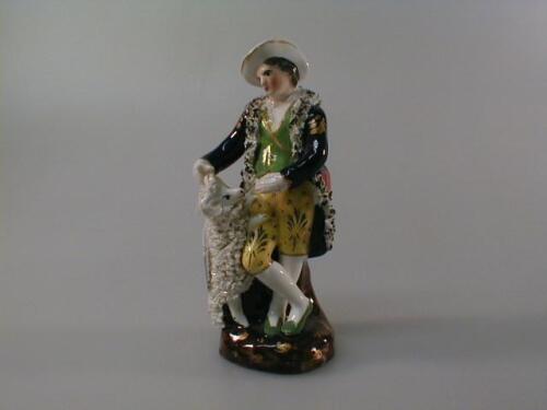 A 19thC Staffordshire pottery figure