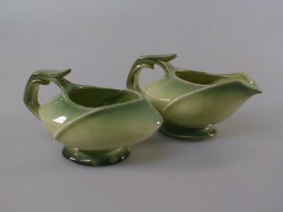 A pair of Art Deco green sauceboats