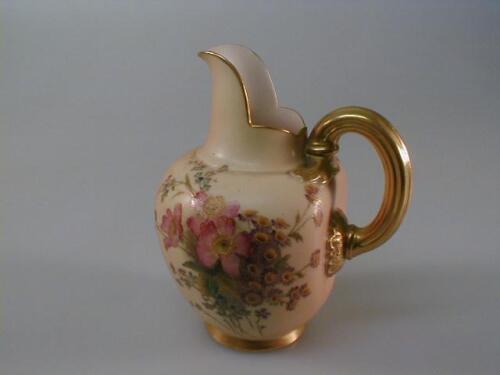 A Royal Worcester cream jug