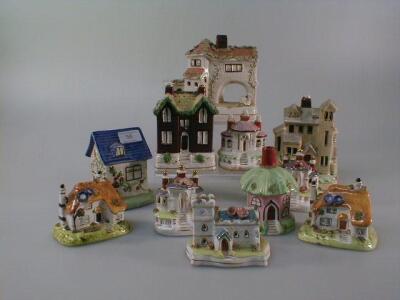 A collection of eleven Staffordshire style pottery buildings