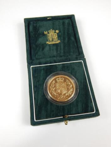 A Queen Elizabeth II gold £5 coin