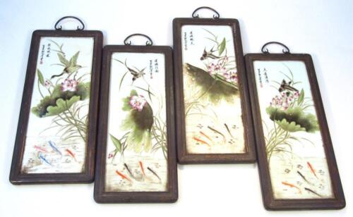 Four various Japanese Meiji period porcelain wall plaques