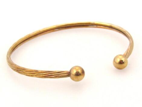 A 'C' shaped bangle