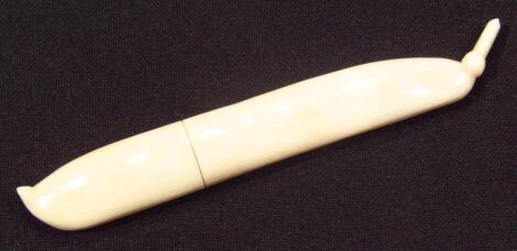 A late 19thC/early 20thC ivory pea pod needle case