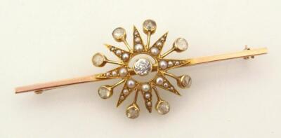 A ladies star burst design bar brooch