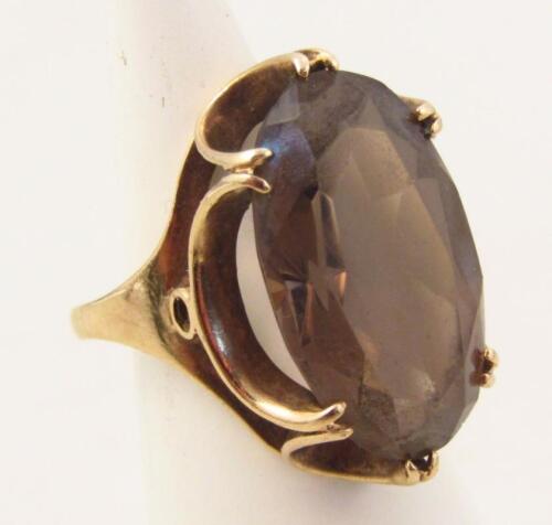 A ladies 9ct gold dress ring