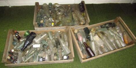 A quantity of various glass bottles