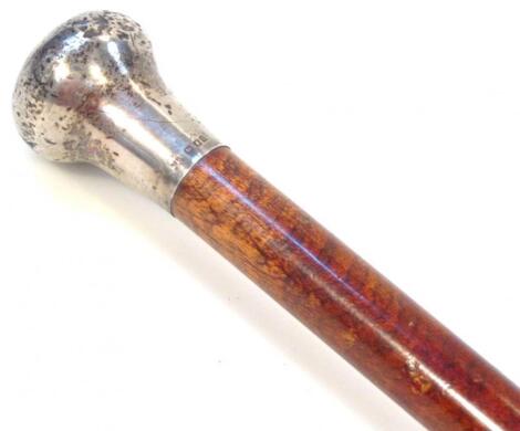 An early 20thC tiger wood walking cane