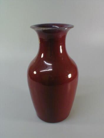 A Chinese Sang de Boeuf baluster vase