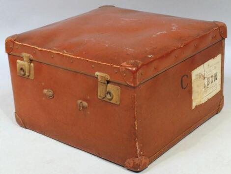 An early 20thC leather case travelling hat box