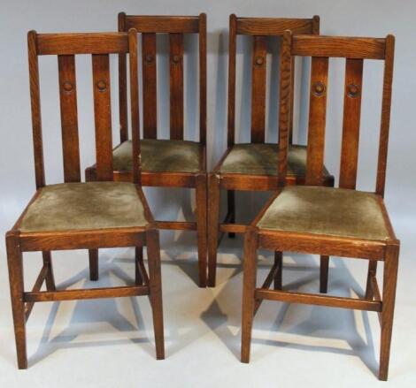 A set of four early 20thC oak dining chairs