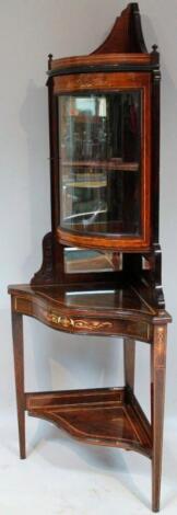 An Edwardian figured rosewood painted and inlaid corner cabinet