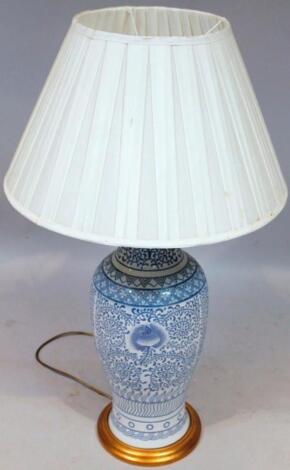 A Qing style 20thC decorative blue and white lamp vase