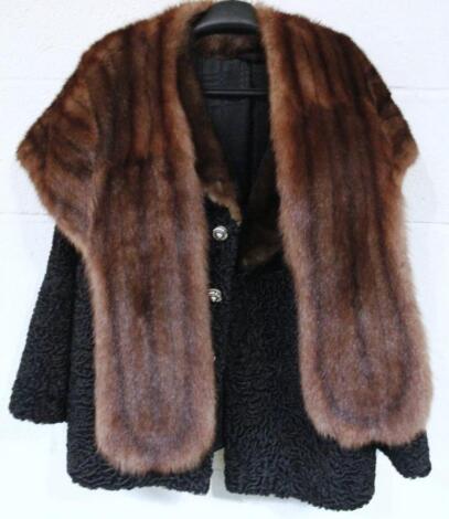 A 20thC ladies fur lined jacket