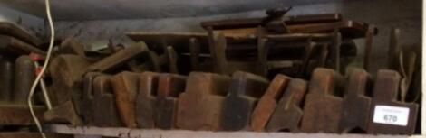 A large quantity of late 19thC/early 20thC wooden moulding and block planes