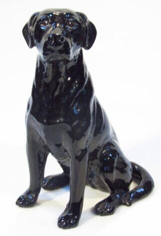 A Beswick fireside model of a black Labrador