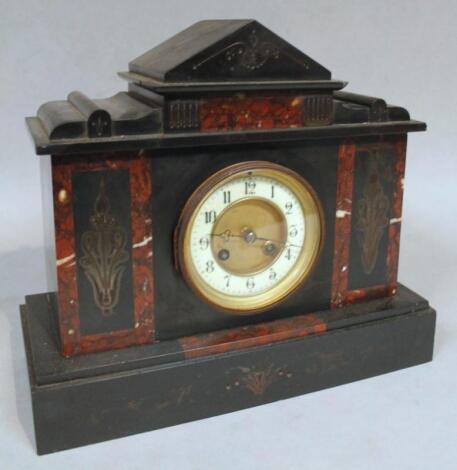 A late 19thC black slate and marble mantel clock