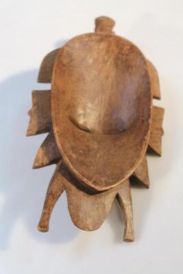 A heavily carved African tribal hardwood face mask - 2