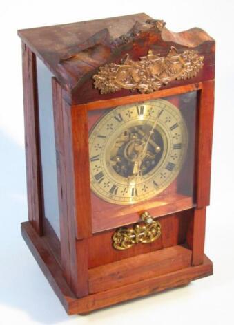 A 19thC pine and yew wood cased mantel clock