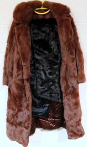 An early 20thC ladies brown fur jacket