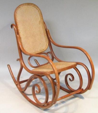 A 20thC bergere bentwood rocking chair