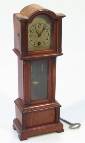 An early 20thC cased miniature long case clock