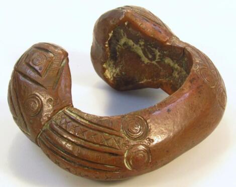 A 20thC African metal money bangle