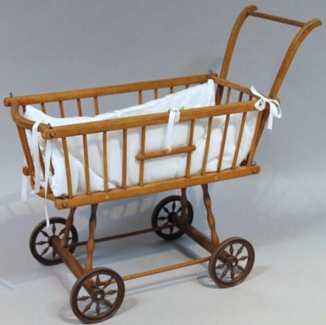 An early 20thC beech pram