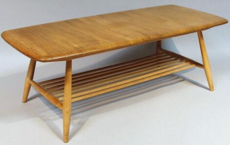 A 20thC Ercol light yew wood finish coffee table