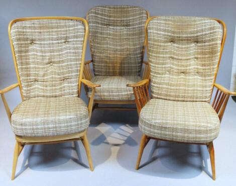 A set of three 20thC Ercol light yew wood finish armchairs