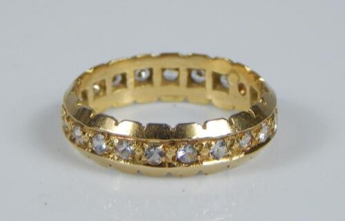 An 18ct gold eternity ring