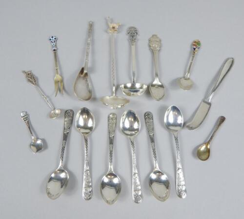 A collection of white metal items