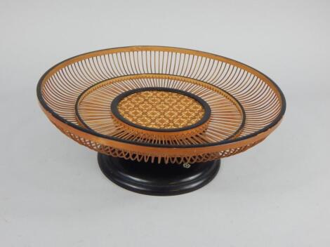 A straw work and wicker lazy Susan