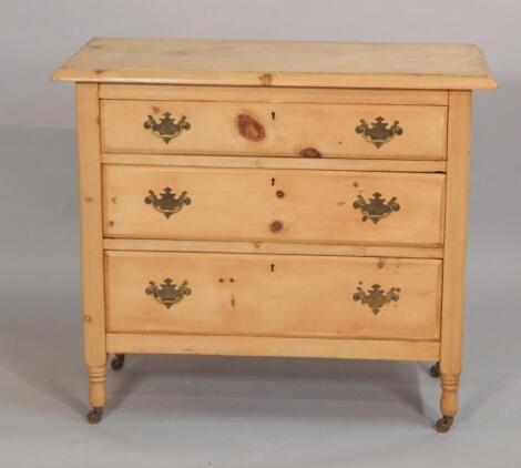 An early 20thC stripped and lightly polished pine chest