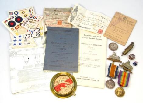 Various WWI medals and associated badges