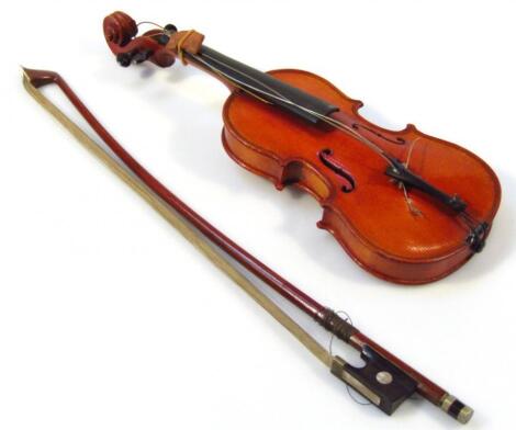 An early 20thC miniature or tradesman's piece violin